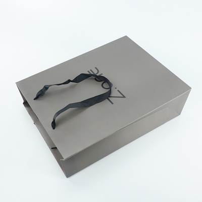 De Zak van dragerart kraft coated paper shopping voor de Gift van de Klerenkleding